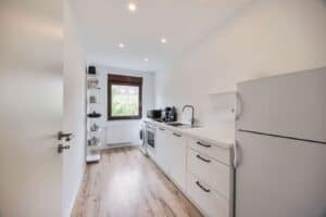 Ein eigener Raum für kulinarische Kreativität – moderne Einbauküche im Kaufpreis enthalten